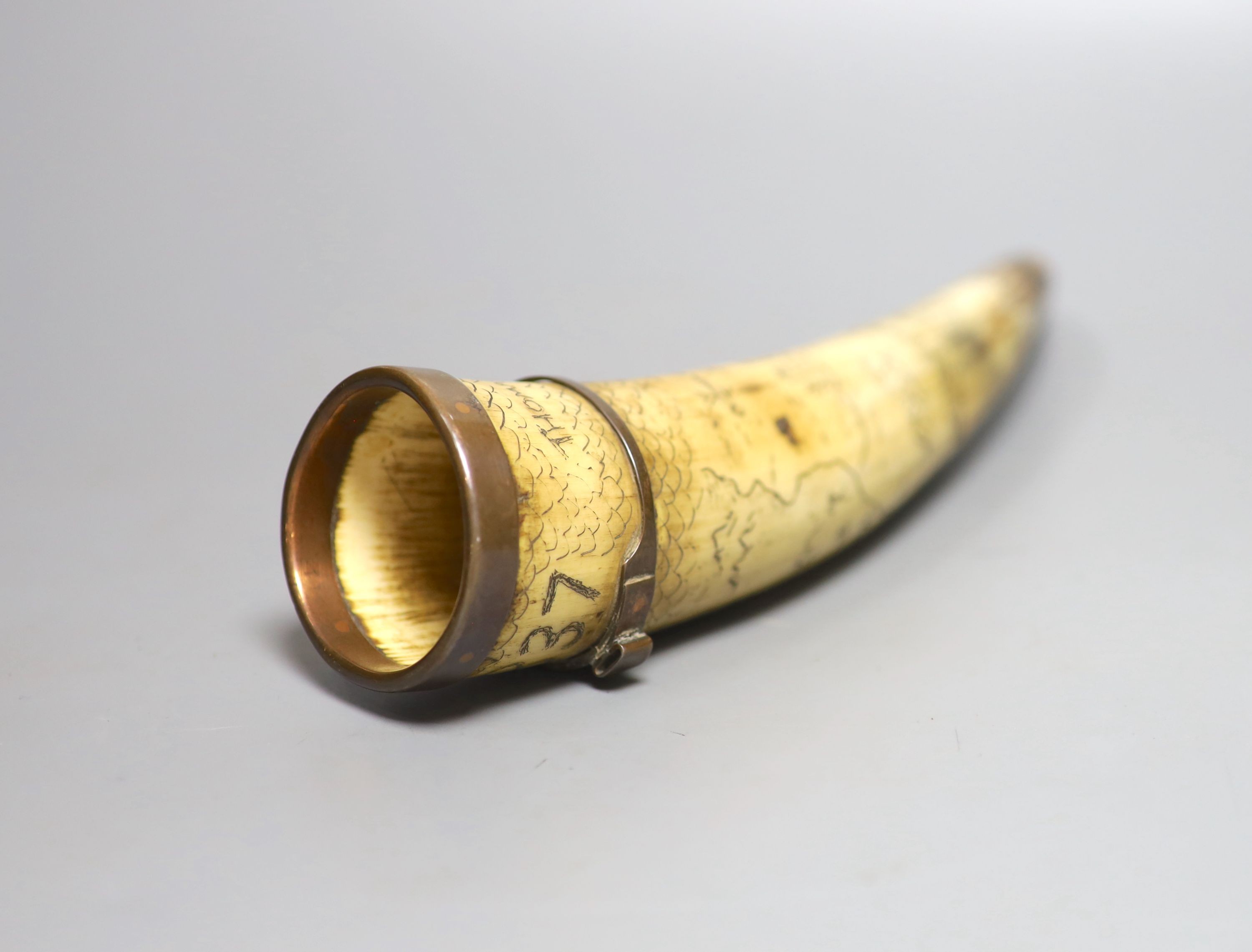 A scrimshaw horn beaker, bearing date 1837, 28cm